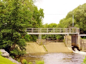 The old Quance dam is a feature of the Lynn River in Simcoe between Argyle Street and Victoria Street. Norfolk council heard this week that there have already been expressions of interest from investors and developers who would like to work with the county on the revitalization of this section of waterfront in downtown Simcoe. Monte Sonnenberg/Postmedia Network