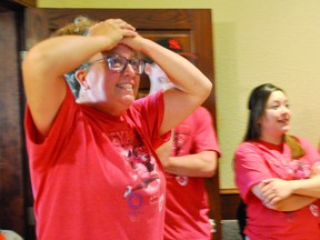 Lisa Wylie watches Canada's women's rugby sevens team take on Brazil the evening of Wednesday, July 28, just before her 21-year-old daughter Keyara Wardley, from Vulcan, scores her second try of Canada's first game of the Tokyo Olympics Local residents had gathered at the Vulcan Lodge Hall to watch the game. Canada defeated Brazil first 33-0 on Thursday morning in Tokyo -- Wednesday evening locally -- but later that day lost 26-14 to Fiji. Wardley injured her leg against Fiji and had to be taken off the field in a medical cart. STEPHEN TIPPER