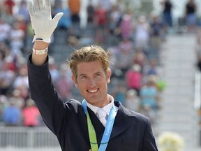 Chris von Martels of Ridgetown waves to the crowd after winning a bronze medal at the 2015 Pan Am Games. Mark Wanzel