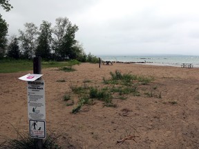 While there wasn't a big demand for beach-front parking at the Christie Beach Conservation Area on a wet and gloomy day Wednesday, the Grey Sauble Conservation Authority property has increased in popularity recently and beachgoers will soon be required to pay for parking. Greg Cowan/The Sun Times