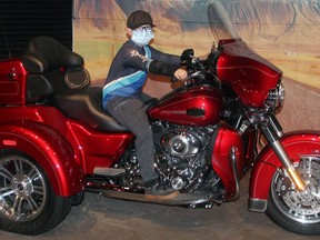 Spencer Jones, 10, of Leduc checks out the 2013 Harley-Davidson Triglide Ultra Classic that's part of the Motobikus Mechanicus...a Love Story exhibit on now at the Reynolds-Alberta Museum.
Christina Max