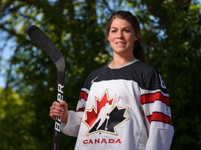 Team Canada hockey player Rebecca Johnston poses for a photo outside her home in Calgary on Wednesday, June 2, 2021.