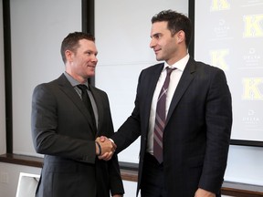 Kingston Frontenacs general manager Kory Cooper congratulates new head coach Luca Caputi during a media conference at the Kingston Delta Waterfront on Wednesday July 14, 2021. (Ian MacAlpine/The Whig-Standard/Postmedia Network)