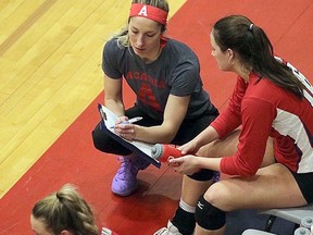 Vanessa Chorkawy speaks to a player on the Acadia women's volleyball team.