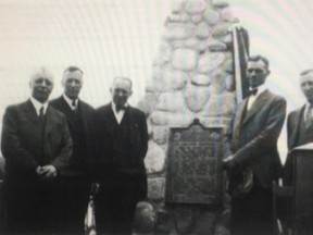 •	IMG_2672 – Unveiling of Mackenzie Cairn, across Peace River from Fort Fork site, 1929. People arrived at River Lot 19 for the ceremony via various means – sternwheeler D.A. Thomas, car, and perhaps, horse and buggy. Sir Alexander Mackenzie overwintered 1792-93 at the fort on his quest of the Pacific Ocean. Among those attending: (L-R) Hugh Allen; D.M. Kennedy; Kinwell (Joe) Neff (later owner of Fort Fork site land); Frank Smith and James Homer Johnston (discoverer, in 1927, of the fort site). The photograph – a photograph of a photograph from Peace River Remembers, Page 74.