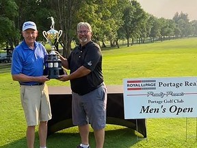 Don Jackson (left) receiving the Men's Open trophy. (supplied photo)