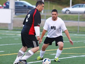 Sudbury Regional Competitive Soccer League over 40 division players from the Caruso and RPG teams battle for the ball during semi-final action from James Jerome Field in Sudbury, Ont. on Thursday October 12, 2017.