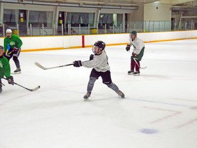 Owen Fergusson with a shot on goal during Saturday's scrimmage at Pete Palangio Arena. Mickey Naughton Photo