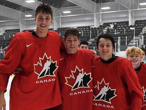 David Goyette (centre) poses for a photo with fellow participants in the 2021 Hockey Canada Summer Showcase.
