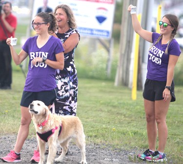 Rick Fall wraps up his cross-country run on Saturday, Aug. 7, 2021 in Sault Ste. Marie, Ont. Fall is welcomed by supporters. (BRIAN KELLY/THE SAULT STAR/POSTMEDIA NETWORK)