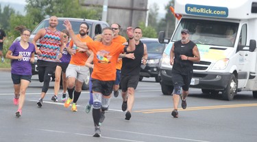 Rick Fall wraps up his cross-country run on Saturday, Aug. 7, 2021 in Sault Ste. Marie, Ont. Fall prepares to go from Great Northern Road to Second Line East. (BRIAN KELLY/THE SAULT STAR/POSTMEDIA NETWORK)