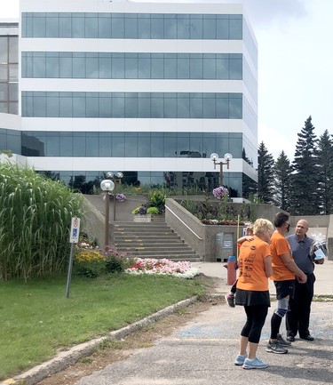 Rick Fall and Colette Michel-Fall wraps up their cross-country trek at Civic Centre on Saturday, Aug. 7, 2021 in Sault Ste. Marie, Ont. The couple is recognized by Ward 4 Coun. Marchy Bruni. (DANIELLE DUPUIS/THE SAULT STAR/POSTMEDIA NETWORK)
