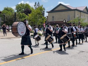 The Kincardine Scottish Pipe Band surprised shoppers at the downtown Promenade with a parade on August 1. Laurie White photo