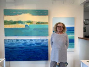 Sylvia Melinz, a founding member of the Victoria Park Gallery, stands with a few of her pieces that are on display in the guest gallery this month. Hannah MacLeod/Kincardine News