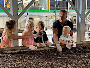 Jamie Depape and his family at Annelida Organics (Supplied)