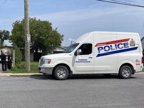Kingston Police on the scene of a shooting on Fergus Street in Kingston, Ont., on Friday, Aug. 13, 2021. The incident took place the day before.