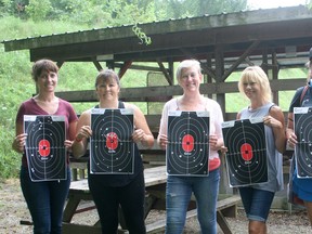 Showing off their targets at Claybird Gun Club Aug. 8 are, from left, Shannon McClenaghan, Pam Campbell, Annemarie Freeman, Christine Somerville, Erin Murphy and Eliese Arnold.