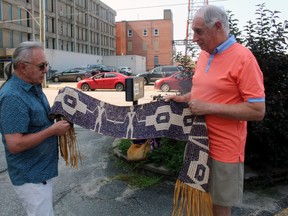 Maurice Switzer explains the significance of the 1764 wampum belt marking the Treaty of Niagara to retired superior court justice George Valin.
PJ Wilson/The Nugget