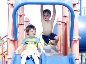 Nohlan Duguay, left, three, was playing with his cousin Deacon Trochimchuk, at the Hollinger Park playground on Tuesday, while they were out to enjoy the warm weather. Environment Canada issued a heat warning for Timmins, Cochrane and Iroquois Falls just before 4 p.m. It noted the hot and humid conditions we are currently experiencing are expected to last through Saturday. RICHA BHOSALE/THE DAILY PRESS