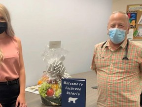 Abbigail Tremblay, the physician recruiter with Worker Bees, and Dr. McGuire pose at the Cochrane Family Health Team with a Welcome Basket donated by A&G Freshmart in Matheson. SUBMITTED PHOTO