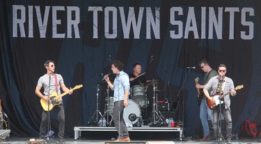 River Town Saints, performing at an outdoor drive-in concert at Riverside Park in Pembroke on Saturday, Aug. 7. From left, Chris McComb, Chase Kasner, Jordan Potvin, Joe Patrois and Jeremy Bortot.