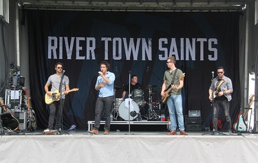 River Town Saints, performing at an outdoor drive-in concert at Riverside Park in Pembroke on Saturday, Aug. 7. From left, Chris McComb, Chase Kasner, Jordan Potvin, Joe Patrois and Jeremy Bortot.