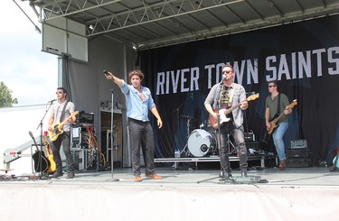 River Town Saints, performing at an outdoor drive-in concert at Riverside Park in Pembroke on Saturday, Aug. 7. From left, Chris McComb, Chase Kasner, Jeremy Bortot, and Joe Patrois.