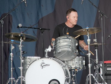 River Town Saints drummer Jordan Potvin performing on stage in Pembroke at an outdoor concert on Aug. 7.