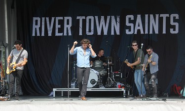 River Town Saints, performing at an outdoor drive-in concert at Riverside Park in Pembroke on Saturday, Aug. 7. From left, Chris McComb, Chase Kasner, Jordan Potvin, Joe Patrois and Jeremy Bortot.