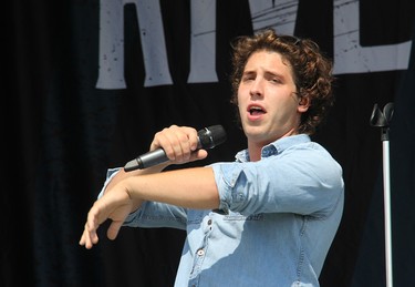 River Town Saints lead vocalist Chase Kasner on stage in Pembroke at an outdoor concert in Pembroke on Saturday, Aug. 7.