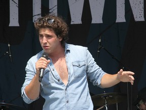 River Town Saints lead vocalist Chase Kasner on stage in Pembroke at an outdoor concert on Saturday, Aug. 7.