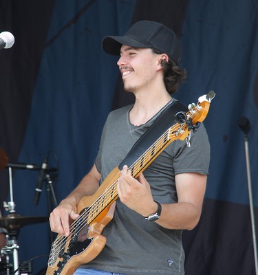 Lemon Cash bass player Dave Campbell performing on stage in Pembroke at an outdoor concert on Aug. 7.