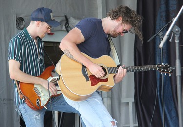 Lemon Cash's Joel Ryan (left) and Cory Papineau on stage in Pembroke on Saturday, Aug. 7.