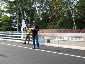 Nipissing First Nation Chief Scott McLeod speaks during a ceremony, Friday morning, on the reopening of the Duchesnay Creek bridge. Michael Lee/The Nugget
