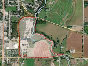 A proposed business park - the red hashed area in this arial view - on Concession 6 at the south end of Port Elgin would include 17 lots of various sizes on Town-owned land adjacent to the Lamont Sports Park - outlined in red - where construction of four ball diamonds is underway. [Town of S
augeen Shores]