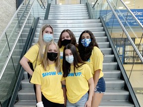 Grade 12 students from Superior Heights, Collegiate & Vocational School, volunteer their time on Monday, Aug. 23 at ADSB Ignite 2021 Event. Bottom row, Hannah Heimonen, 17 and Emily St. Jean, 16. Top row, Gracie Jack, 16, Julliette Lamour 17, and Emille Vezina, 16.   Danielle Dupuis/The Sault Star