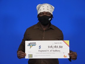 Ray Alexander of Sudbury celebrates his lottery prize totalling more than $214,000.
