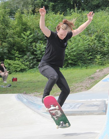 Molly Leahy shows off the form that earned her second place in the Ladies' Division at the first Heavy Medal Skateboard Competition and Showcase held on Aug. 14 at the Rapids Skate Park.