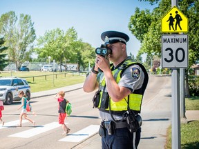 In the coming weeks, school zones will once again be busy with traffic. Drivers are reminded to remain vigilant of speed and parking signs. Photo Supplied