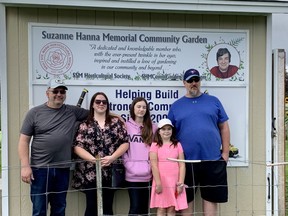 amily and friends of late Suzanne Hanna pay tribute to her outstanding contributions to the garden community at the newly named Suzanne Hanna Memorial Community Garden, formally known as the Forest Heights Community Garden. Her family gathered at the renaming ceremony on Aug. 30, Michael Hanna (husband), Natalie Mantha (daughter), Emily Mantha (granddaughter), Kaitlyn Mantha (granddaughter) and Bill Mantha (son-in-law).