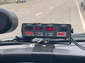 Police stop a vehicle on Friday that was clocked doing 142 km/hr in a 90 zone.