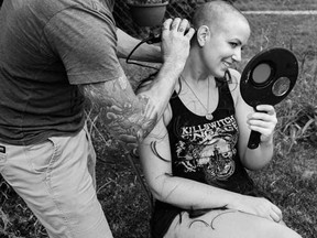 Farren's partner Kevin shaves her head, Farren was recently diagnosed with breast cancer. She stressed the importance of self-breast exams for all women.