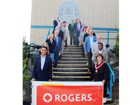 Rogers Communications has signed on as the presenting sponsor for the 2022 Ontario Winter Games which will be hosted by the County of Renfrew. On hand for the announcement on Aug. 25 during Renfrew County council (clockwise from bottom left) were Sameer Sheth, senior director of service expansion Rogers; Jodi Parps, senior manager of government relations Rogers; Cindy Burwell, Ontario Winter Games manager; Petawawa Mayor Bob Sweet; Greater Madawaska  Mayor Brian Hunt; Admaston/Bromley Mayor Michael Donohue;  Bonnechere Valley Mayor Jennifer Murphy; Renfrew Reeve Peter Emon, chairman Ontario Winter Games committee; Craig Kelley, director, County of Renfrew; Brudenell, Lyndoch  and Raglan Mayor Sheldon Keller; Paul Moreau, CAO, County of Renfrew; McNab/Braeside Mayor Tom Peckett; Whitewater Region Reeve Cathy Regier; Laurie Serran, sponsorship chairwoman Ontario Winter Games; North Algona Wilberforce Mayor James Brose; Councillor Daniel Lynch, Arnprior; Kyle McHenry, senior project manager of service expansion Rogers and Renfrew County Warden Debbie Robinson.