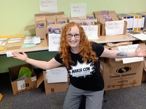 Teen services librarian Brooke Windsor stands next to some of the materials kits available for free to attendees at this Saturday's virtual Maker Con: Rise of the Fandoms event hosted by the Stratford Public Library. Submitted photo