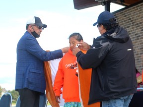 As a sign of support and solidarity, Ballyntine was wrapped in the flag of the Mushkegowuk Nation by  Mushkegowuk Grand Chief Jonathan Solomon and Taykwa Tagamou Nation Chief, Bruce Archibald. TP