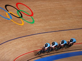 Canada's Allison Beveridge, Ariane Bonhomme, Annie Foreman-Mackey of Kingston and Georgia Simmerling sprint during the women's team pursuit bronze medal of track cycling on Day 11 of the 2020 Tokyo Olympic Games at Izu Velodrome on Tuesday in Izu, Japan.