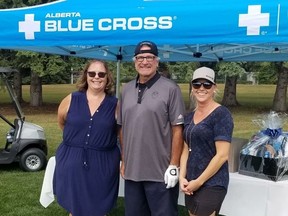 AB Blue Cross members attend the Glenn Anderson Day of Golf for the Cure Cancer Foundation. Photo Twitter: @ABBlueCross.