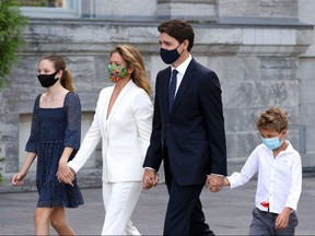 Canada's Prime Minister Justin Trudeau, his wife Sophie Gregoire Trudeau and children arrive at Rideau Hall to ask Governor General Mary Simon to dissolve Parliament on August 15, 2021.