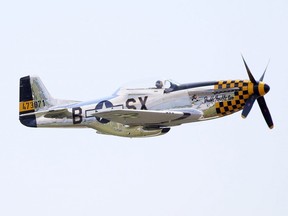 A P-51 Mustang flies over the Chatham-Kent Municipal Airport in Merlin, Ont., on Saturday, Aug. 7, 2021. The Second World War-era plane was bought in 2020 by Peter Timmermans of Blenheim, Ont. (Mark Malone/Chatham Daily News)