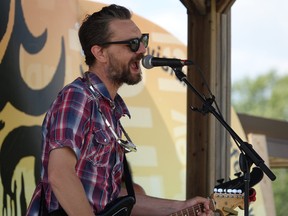 Mike Procyshyn playing on stage during the 13th "Maybe Annual" Coney Island Music Festival on July 25.